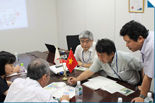 JWA members explaining to Mr. Phuong 