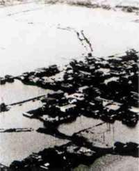 洪水におそわれた久留米市街部の写真